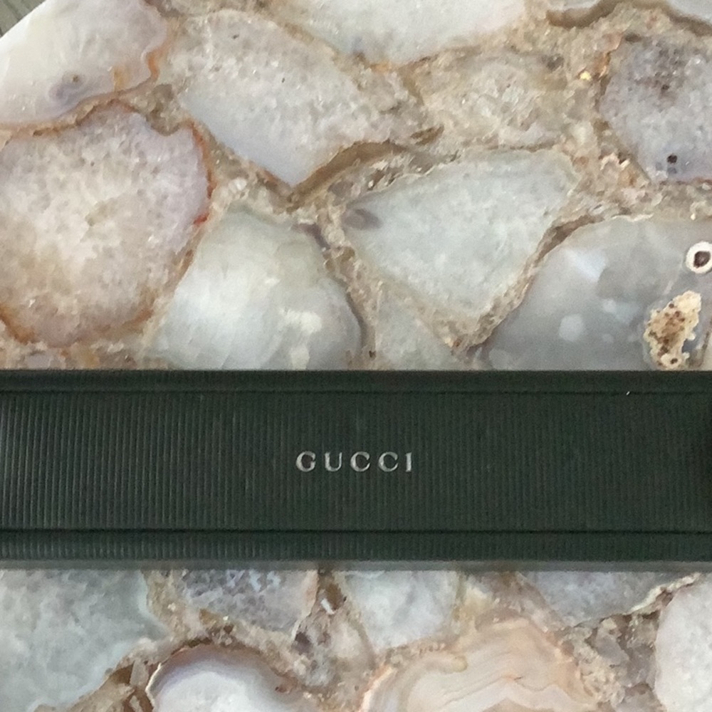 Men’s & women’s Gucci watch